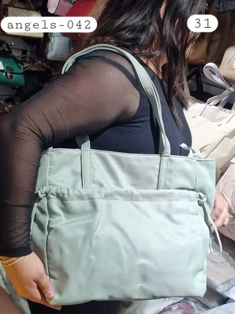 Cartera tipo tela con bolsillo