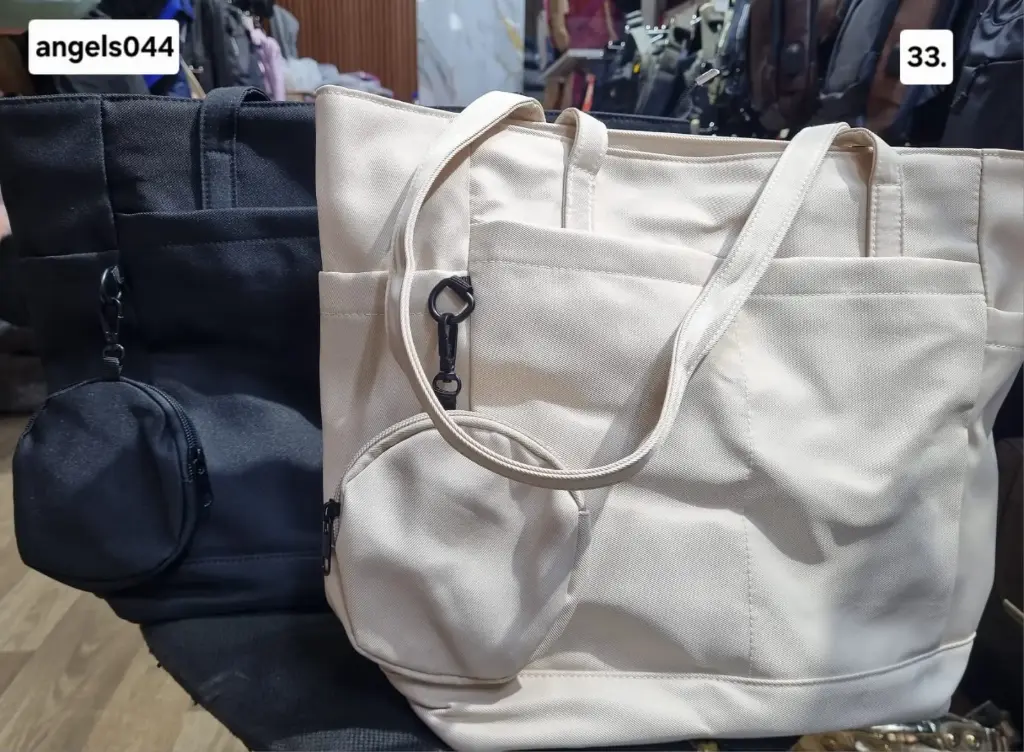 Bolso con cierre pequeño redondo